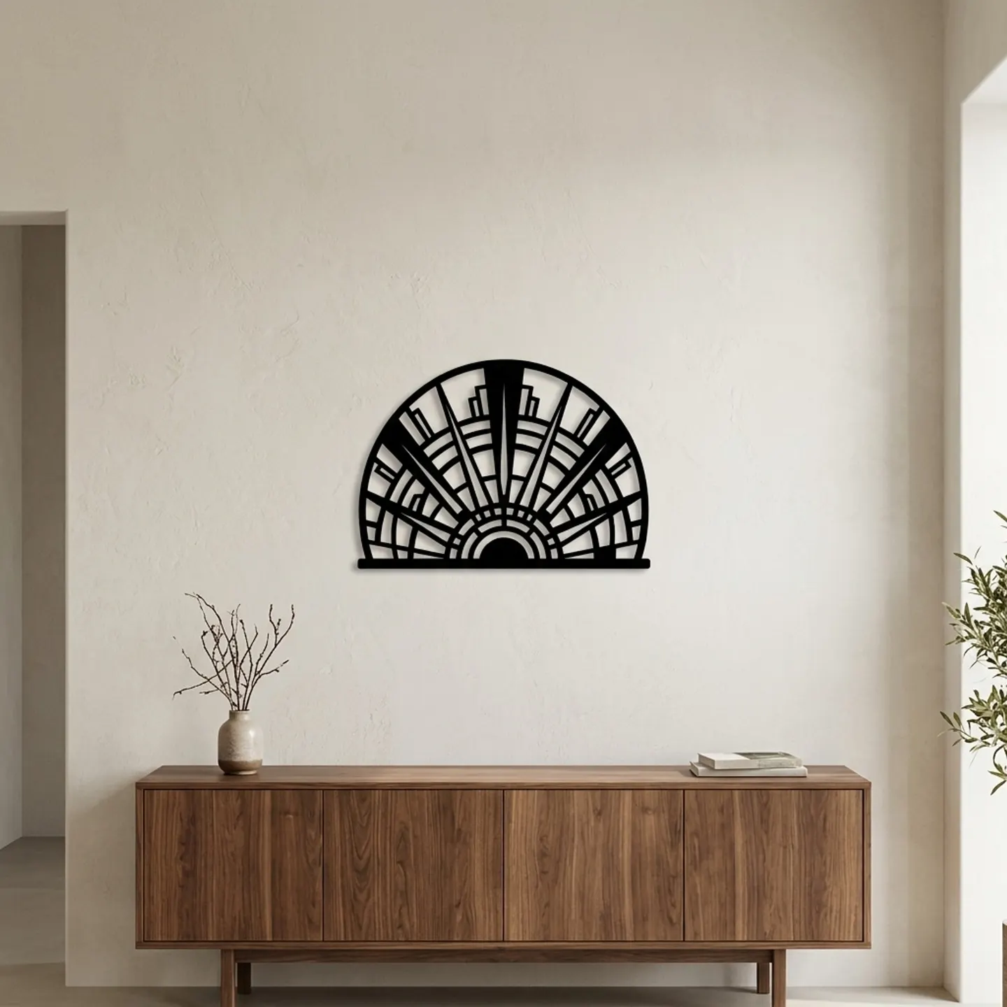 Black art deco sunburst steel wall art above a walnut sideboard